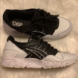 Size 9 , black and white  sneakers . Gentle use.